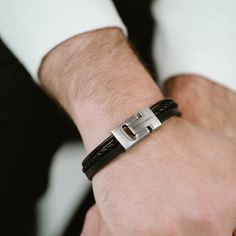 The "Casual Cole" bracelet is a testament to minimalist design and quality craftsmanship. It features three different styles of soft, genuine leather cords, bound together by a sleek Stainless Steel slider, ensuring a comfortable fit. The signature stainless steel clasp, engraved with the STEEL & BARNETT logo, offers a secure closure and a subtle nod to the brand's attention to detail. Perfect for the man who values a clean, composed look paired with the timeless appeal of leather. - WIDTH: 12 m Gold Armband, Black Edition, Minimalist Jewelry, Leather Cord, Different Styles, Mens Bracelet, Jewelry Pieces, Minimalist Design, Valentine Gifts