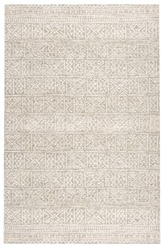 a white rug with an intricate design on the front and back side, in neutral tones