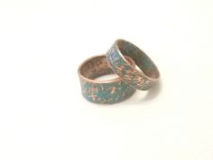 Custom made blue patina copper matching rings for two Engraved Personalized * Sizing : Please check your ring size before submitting your order and if you are not sure what ring size you need, please visit your local jewelry store to make sure that you will get the size that you need. Please do not hesitate to contact me if you have any questions! ---------Standard international shipping usually takes 16-24 days, but sometimes shipping can take more, so I can't guarantee you exact arrival time. The postal services are overloaded due to Christmas and New Year holidays season. Oxidation is not permanent! This ring will change in appearance, especially with daily wear. It will wear off in the high areas over time causing a patina that is unique to the piece. For best results, remove ring when