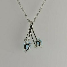 "14K White Gold Blue Topaz Diamond Accent Suite, earrings and necklace, pear shaped blue topaz matched color trillion blue, 5mm topaz ear studs, pendant with 5x7mm blue topaz, 18\" chain, 4 diamonds, 4 blue topaz total, Circa 1990, 4.5 grams Stock # BB238CPOC30 Most rings are sizable for a small fee. If the ring you are considering is the incorrect size contact us for a quote. This listing contains photographs of the actual item you will receive. Our items are in excellent condition with little Earrings And Necklace, Boston Ma, Ear Studs, Pear Shaped, Blue Topaz, Topaz, Pear, Silver Necklace, Diamonds