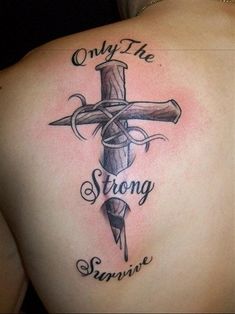 a cross with the words only the strong survive on it