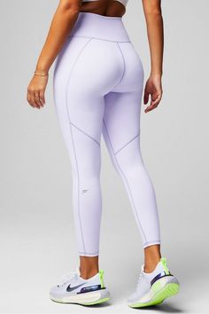 Define PowerHold® High-Waisted 7/8 Legging Fabletics purple female Activewear >> Womens >> Bottoms >> Leggings >> 7/8s PowerHold regular Training 4-Way Stretch/Moisture-Wicking/UPF Protection Functional Stretch Purple Bottoms, Purple Compressive Functional Leggings, Functional Purple Leggings For Pilates, Purple Stretch Go-dry Bottoms, Purple Stretch Leggings For Light Exercise, Functional Fitted Purple Bottoms, Compressive Purple Gym Pants, Lavender Fitted Workout Leggings, Fitted Lavender Workout Leggings