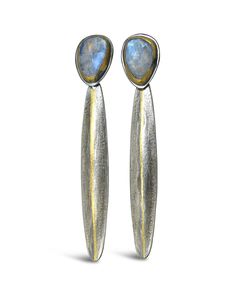 Gold & Silver Earrings - A flashing moonstone replete with vibrant rainbow color anchors the post of these sleek oxidized sterling silver earrings. 24k gold keum-boo accents the bezel setting and flows in a delicate line down the drop. Sterling silver post. Each is unique and will vary. Keum Boo Earrings, Keum Boo, Metalsmithing Jewelry, Rainbow Color, Oxidized Sterling Silver, Moon Stone, Ear Wire, Anchors, Bezel Setting