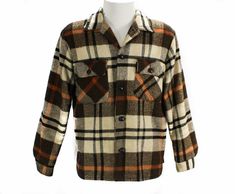 According to the label, this is a college man's Action Jacket! This 1960s men's casual jacket has a notched lapel, faux leather buttons and two flap-front chest pockets in a lumberjack look. Has buttoned cuffs to the long sleeves, rounded notch hems, and a fleece lining. Men's Size Medium to Large Measurements Chest 44, Waist 44; Shoulder to Shoulder 19, Sleeve Length 24.25, Neck to Hem 26.75 Inches *note that the measurements indicate a large, but the fabric's weight and thickness suggest a med Mens Jackets Casual, Fandom Outfits, Sharp Dressed Man, Brown Plaid, Plaid Jacket, Lumberjack, Male Fashion, Casual Jacket, Men's Casual