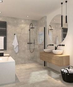 a modern bathroom with two sinks and mirrors