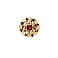 A garnet ring.  Bezel set in the center of the ring is a round cut Garnet. The ring has a ribbon style halo around the center stone. The ring has a slight cathedral shank. This ring is a size 7. This listing includes one free sizing up or down 2 sizes. Once a ring is resized, we guarantee the work but we are unable to offer a full refund on the ring. Please contact us for additional sizing options and an updated ship date. Metal Content Guaranteed 10k Yellow Gold Weight: 3.3 grams Stone Informat Vintage Ruby Ring With Round Accent Stones, Round Ruby Birthstone Ring Stamped 14k, Vintage Round Ruby Birthstone Ring, Victorian Style Round Birthstone Ring For Gift, Vintage Style Ruby Birthstone Ring, Antique Ruby Ring With Round Birthstone, Victorian Ruby Ring With Birthstone, Victorian Style Birthstone Ring Gift, Victorian Ruby Birthstone Ring