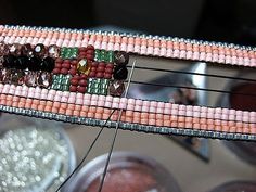 a close up of beads and other items on a table