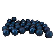 a pile of blue christmas balls on a white background