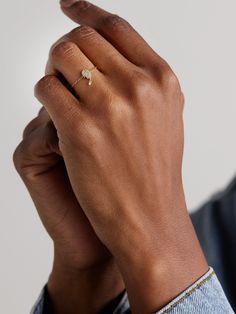 Persée's dainty chain ring is strung with the 'Hand of Fatima', which is also known as the protective Hamsa. It's cast from 18-karat gold and dusted with shimmering diamonds, leaving just one dangling from the middle finger to show off the brand's signature "pierced" technique. Single Diamond White Gold Jewelry In Recycled Gold, White Gold Jewelry With Single Diamond In Recycled Gold, White Gold Single Diamond Jewelry In Recycled Gold, White Gold Recycled Jewelry With Single Diamond, 14k White Gold Teardrop Jewelry, 14k White Gold Jewelry With Rose Cut Diamonds, Fine Jewelry Open Ring With Single Diamond, Recycled Gold Promise Ring With Single Cut Diamonds, Minimalist Tarnish Resistant Diamond Ring