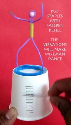 a person is holding a paper cup with an object in it's mouth and the caption reads, rub rules stifies smith ballpen refill the vibrans will make wire mean dance