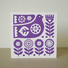 a card with a bird and flowers on it