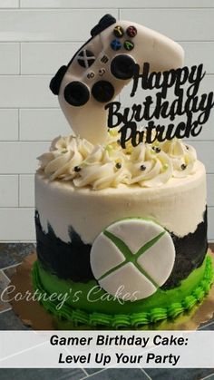 a birthday cake with a video game controller on top