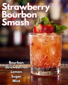 Enjoy the sweet taste of summer with our Strawberry Whiskey Smash recipe. Strawberries and whiskey creates a cocktail that's perfect for sipping. Strawberry Smash Cocktail, Whiskey Smash Recipe, Fun Beverages, Moonshine Cocktails, Whiskey Smash, Bourbon Smash, Mint Drink, Bourbon Recipes