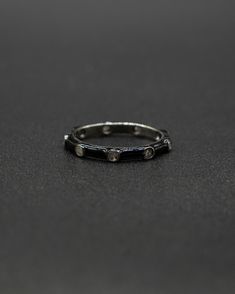 Our exquisite Black Enameled Band features glittering diamonds set in an elegant, enameled silver ring. This item will ship directly from Bali via DHL delivery. Please allow up to 15 business days to arrive. Elegant Jewelry With Single Cut Diamonds And Enamel, Diamond Enamel Ring With Black Enamel, Luxury Enamel Ring With Diamond Accents As Gift, Luxury Enamel Ring With Diamond Accents For Gift, Elegant Black Enamel Ring, Fine Jewelry In Silver With Black Enamel, Fine Silver Jewelry With Black Enamel, Enamel Jewelry With Diamond Accents For Anniversary, Elegant Black Enamel Diamond Ring