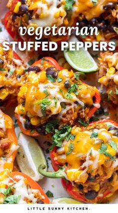 mexican stuffed peppers on a plate with limes and cilantro in the background