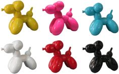 four different colors of balloons shaped like poodles