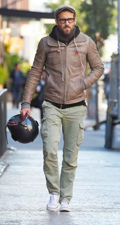 Down day: Ryan Reynolds worked a dapper off-duty look when he stepped out in Soho, New York on Monday Mens Cargo Pants Outfit Street Style, Mens Cargo Pants Outfit, Ryan Reynolds Style, Cargo Pants Outfit Street Style, Mens Cargo Pants, Stylish Leather Jacket, Outfit Street Style, Biker Leather Jacket, Cargo Pants Outfit