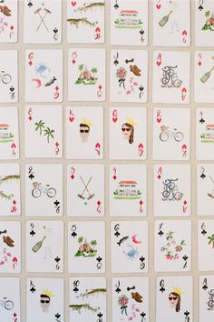 several playing cards with different designs on them are arranged in the shape of a square