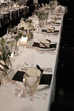 a long table is set up with place settings