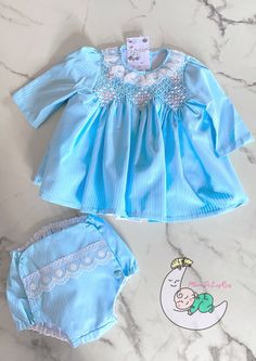 Handmade Blue dress. Smocked Hand Embroidered. Diaper cover. Spring Smocked Dress With Lace Trim, Blue Smocked Back Dress For Spring, Blue Smocked Dress With Smocked Bodice For Spring, Blue Smocked Dress For Spring, Blue Smocked Dress With Bodice For Spring, Spring Blue Smocked Dress, Blue Long Sleeve Smocked Top, Blue Smocked Top With Smocked Back For Spring, Blue Smocked Bodice Top For Spring