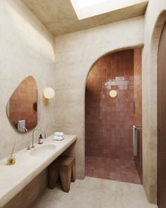 a bathroom with two sinks and a large mirror