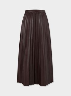 This Accordion Pleated Faux Leather Skirt-Brown is a stylish and versatile addition to your wardrobe. Elevate your style with this chic and timeless piece. Elegant Brown Full Pleated Skirt, Elegant Pleated Faux Leather Skirt, Brown Pleated Leather Skirt, Brown A-line Pleated Skirt, Solid A-line Pleated Skirt With Accordion Pleats, Faux Leather Skirt, Timeless Pieces, Leather Skirt, Faux Leather