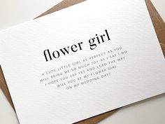 a card with the words flower girl written in black and white on it's front