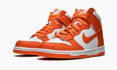 The Nike Dunk High GS “Syracuse” is the youth sizing of an original colorway from the college basketball inspired “Be True to Your School” pack from 1985.  Nike brought back the popular “Syracuse” look on the low-top version of the Dunk in 2020 to coincide with the Dunk’s 35-year anniversary.  In 2021, the white-and-orange colorway returned on the Dunk High for the first time since 2016.  Fiery Orange Blaze leather panels on the forefoot, eyelets, collar, and heel provide a burst of color agains 35 Year Anniversary, Orange Jordan, School Pack, Orange Shoes, Nike Dunk High, Dunk High, Stadium Goods, Nike Kids, College Basketball