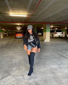 Thigh Boots With Shorts, Shorts And Boots Street Style, Grey Tall Boots Outfit, Thigh High Boots Outfit Winter Baddie, Thigh High Boots With Shorts Outfit, Hoodie Shorts Thigh High Boots, Shorts With Thigh High Boots Outfits, Thigh Boots And Shorts, Jean Shorts And Knee High Boots Outfit