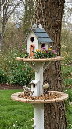 a bird house is hanging from a tree