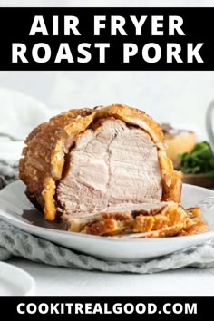 air fryer roast pork on a white plate with text overlay that says air fryer roast pork