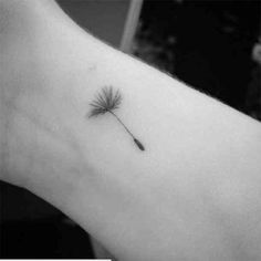 a small dandelion tattoo on the left ankle is shown in black and white