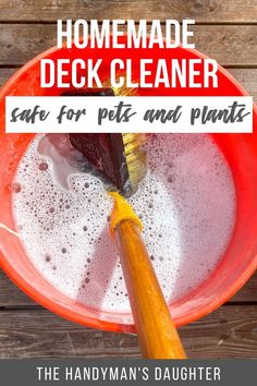 a red bowl filled with water and a yellow brush in it, text reads homemade deck cleaner salt for pets and plants the handyman's daughter