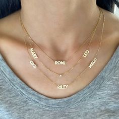 This necklace features up to 6 names of your choice and diamonds in the chain. UPPERCASE letters only. Price is based on how many names you enter. Example: if entering 4 names, select 4 for number of names. If you want to order one with a date, please use dashes ONLY in between the numbers. 14K Yellow Gold or 14K White Gold Height: Approx. 0.30" Length: Based on number of letters - up to 10 allowed per name ALL UPPERCASE LETTERS ONLY FINAL SALE Diamond Nameplate Necklaces, Gold Necklaces With Names In Diamond, Gold Diamond Necklaces With Names, Silver Diamond Name Necklace, Uppercase Letters, Upper Case, Blackpink Fashion, Personalized Necklace, Name Necklace