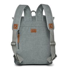 Introducing the Discovery Backpack: Classic design meets modern versatility. Crafted from durable cotton canvas and genuine leather. Eco-conscious with recycled hardware and vegetable-based dyes. Features padded laptop compartment and adjustable shoulder straps for comfort. Dimensions: W: 12" H: 17" D: 5.5". Handle drop: 3". Strap drop: 24". An artisanal masterpiece for the adventurous spirit. | TSD Brand Discovery Backpack, Teal Casual Cotton Backpack For Everyday Use, Casual Cotton Backpack For Everyday, Cotton Backpack With Adjustable Straps For Daily Use, Daily Use Cotton Backpack With Adjustable Straps, Casual Canvas Laptop Bag With Large Capacity, Casual Large Capacity Canvas Laptop Bag, Casual Canvas Backpack With Waxed Finish, Casual Outdoor Laptop Backpack, Everyday Cotton Backpack With Waxed Finish