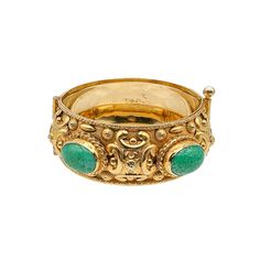 An exquisite Vintage Repousse Cabochon Bangle dating to the 1970s. Featuring four important jade green ceramic stones set within a wonderfully ornate and lustrous, gold plated repousse band. The repousse band is fringed with gold-plated braid and exquisitely detailed with raised aureate motifs of crescents, half spheres and ovals. Condition: In very good condition without damage or noteworthy wear. Materials: Gold Plated Metal, possibly gold cased, ceramic or glass stones Unsigned Fastening: Bar Verde Jade, Punk Vintage, Vintage Bangles, Green Ceramics, Vintage Jewels, Gold Case, Timeless Treasures, The 1970s, Jade Green