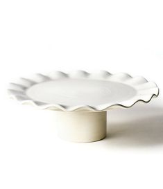 a white plate sitting on top of a table