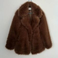 🌟 Luxury Fur Coat! Stay Stylish & Cozy 🦄🌈 Indulge in cloud-like comfort with this plush winter coat! 😌💤 🎁 Perfect Pampering Gift: Ultimate coziness in this stylish piece! 🎀🎁 Treat yourself or surprise a loved one with this cozy, smile-inducing plush jacket. 😍🎉 Specifications: Color: Brown / Beige (any other colors can be requested via message)  Materials: Vegan Fur + Cotton Size Guide (cm): Size| Shoulder | Bust | Length | Sleeve Length  XS-------55--------104------70-----------51----- Cozy Fluffy Fur Coat For Fall, Trendy Fluffy Fur Coat For Cold Weather, Casual Fluffy Fur Coat For Spring, Cozy Fluffy Long Sleeve Outerwear, Trendy Fluffy Long Sleeve Fur Coat, Casual Spring Fluffy Fur Coat, Trendy Brown Winter Fur Coat, Trendy Long Sleeve Fluffy Fur Coat, Fluffy Fur Coat For Cold Weather