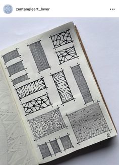 an open book with drawings on it and some lines in the pages next to it