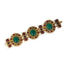 Imposing Chanel Haute Couture Byzantine link bracelet with poured glass cabochons of in emerald, ruby and sapphire. Ornate twisted wire decoration with etruscan work on gilt bronze. Early 1980's Haute Couture, Paris. Marked: Made in France. Length 7.50" Width 1.75". Excellent condition. Ruby And Sapphire, Chanel Bracelet, Sabyasachi Jewellery, Chanel Haute Couture, Chanel Earrings, Chanel Accessories, Twisted Wire, Chanel Vintage, Chanel Jewelry