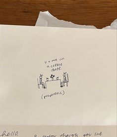 a piece of paper with writing on it and a drawing of two people sitting at a table