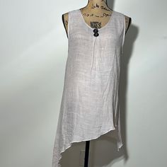 34” Bust (With Stretch), 40”-31” Length(Asymmetrical Length). Sheer, Rounded Neckline. Casual White Asymmetrical Tank Top, White Asymmetrical Tank Top For Summer, Casual White Tank Top With Asymmetrical Hem, Asymmetrical Linen Summer Top, Chic Asymmetrical Tank Top For Beach, Casual Tank Top With Asymmetrical Neckline For Spring, Summer Layering Tank Top With Asymmetrical Hem, Asymmetrical Tank Top For Beach In Spring, Summer Layering Tops With High-low Hem