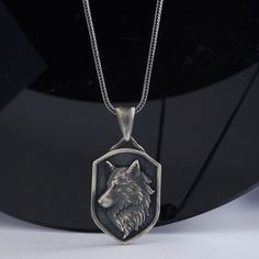 Memorial Gift, Anniversary Gift, Best Friend Gift -fathers day gifts ,Wolf Necklace, Silver Wolf Necklace ,Viking Wolf Pendant,Man Necklace, Oxidized Man Jewelry,Wolf Necklace,Viking Wolf Pendant,Wolf Gifts *  Male / Female * Pendant Diameter : 24mm * 33mm MATERIALS: - Solid 925 sterling silver PRODUCTION METHOD: - Handmade with Care INTERNATIONAL SHIPPING: - We use International Priority Shipping Service - 5-10 Business Days - FREE Shipping PACKAGING: - All handmade sterling silver rings are ni Viking Style Wolf Design Jewelry Gift, Viking Wolf, Man Necklace, Wolf Pendant, Man Jewelry, Men Pendant, Wolves Pendants, Wolf Necklace, Handmade Sterling Silver Rings