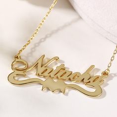 A romantic style,this personalized name necklace is paired with heart. You can write your own name,or the name of someone you are head over heals for,or even a favorite word that you use for inspiration.Chain Type: Cable chainMaterial: 925 SilverPlating Color: Silver, Yellow Gold, Rose Gold Elegant Customized Heart Nameplate Necklace, Heart-shaped Name Necklace As Personalized Gift, Custom Name Heart Nameplate Necklace Gift, Custom Name Heart Necklace For Gifts, Custom Name Heart Necklace, Personalized Name Necklace With Heart Pendant, Heart Pendant Name Necklace As Personalized Gift, Gold Heart Nameplate Necklace, Gold Nameplate Heart Necklace