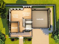 an aerial view of a house with the garage and living room labeled in white letters