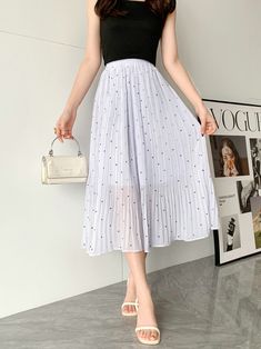 Step into summer freshness with our Fresh Small Polka Dot Chiffon Pleated Skirt—a stylish and playful ensemble designed for the modern woman. This chic midi skirt features a high waist and A-line design with small polka dots, creating a trendy and charming silhouette. The pleated details add a touch of sophistication, making it suitable for various summer occasions. Crafted from high-quality chiffon fabric, this polka dot pleated skirt ensures durability and a soft, luxurious feel against your skin. Whether you're heading to a picnic, a casual outing, or a summer event, this Fresh Polka Dot Pleated Midi Skirt effortlessly captures the essence of summer style with a blend of charm and contemporary chic. Elevate your seasonal wardrobe with this must-have piece that complements your individua Chiffon Pleated Skirt, A Line Midi Skirt, Midi Skirts Summer, Halter Dress Short, Pleated Chiffon Skirt, Fishnet Dress, Spring Break Outfit, Stil Elegant, Pleated Midi Skirt