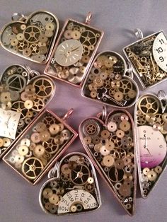 there are many different pieces of clockwork in the shape of heart