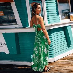 Dreaming of a getaway? Slip into this green tropical maxi dress with a unique sweetheart twist and a playful keyhole. It’s your go-to for turning heads at any resort, poolside party, or when you're simply enjoying the great outdoors. Light and airy, it ensures you stay comfortable while looking fabulous. Pair this Green Tropical Sweetheart Twist & Keyhole Maxi Dress with strappy sandals and a statement necklace for a glamorous evening look, or keep it casual with flat sandals and a sun hat for a Green Dress For Brunch And Vacation, Green Vacation Dress For Holiday, Green Dress For Holiday Vacation, Green Holiday Dress For Vacation, Green Tropical Sundress With Floral Print, Green Floral Print Tropical Sundress, Tropical Print Sundress For Vacation Brunch, Green Tropical Floral Print Sundress, Hawaiian Sleeveless Maxi Dress For Vacation