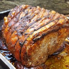 a piece of meat sitting on top of a pan