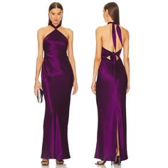 two women in purple dresses with one wearing a halter top and the other wears a slit